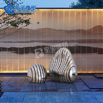 廣場(chǎng)不銹鋼鏡面鵝卵石切面幾何雕塑定制